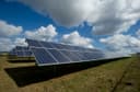 REC Alpha Pure 450W solar panel array, front view — rooftop installation